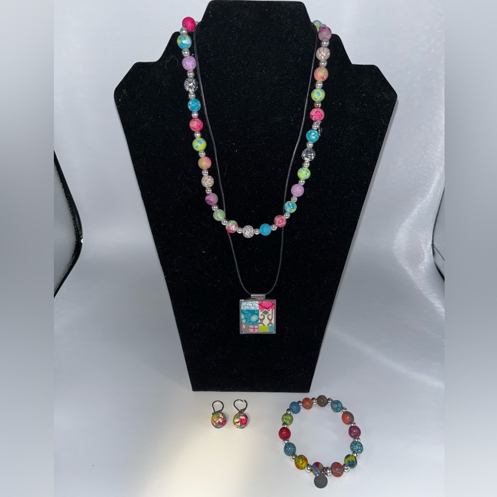 Colorful bead and pendant necklaces with matching bracelet and earrings